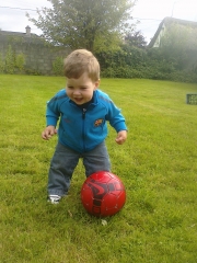 Having so much football fun he\'s going to fall over laughing